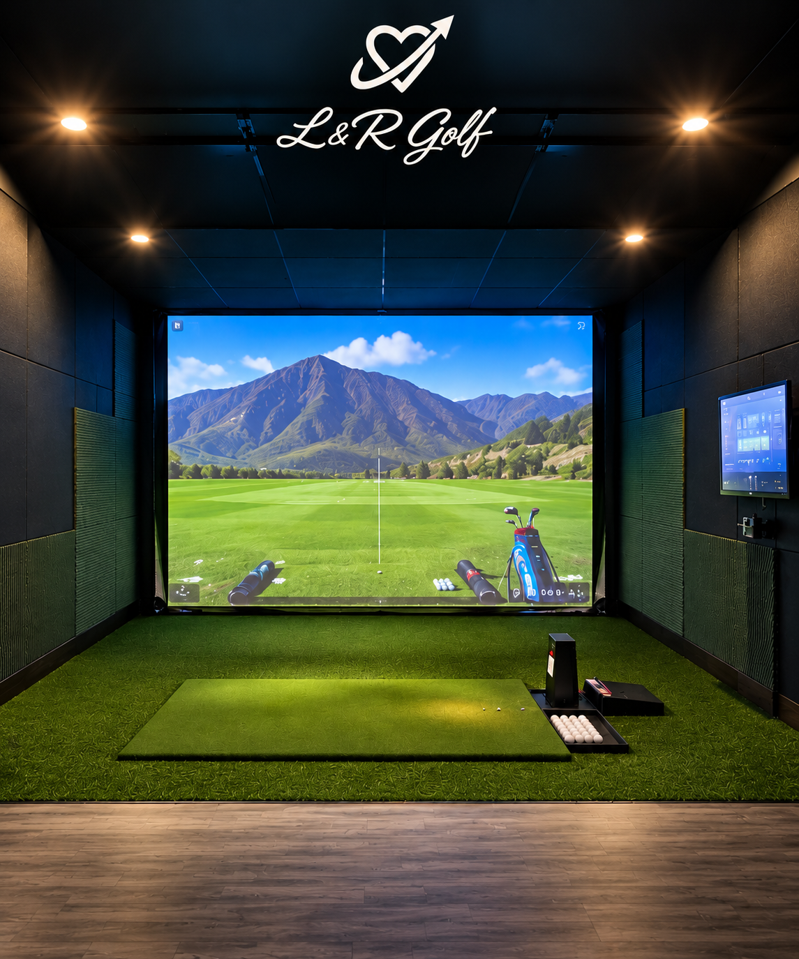 Simulator bay built by L&R Golf, with projection screen, hitting mat and wall-mounted controls